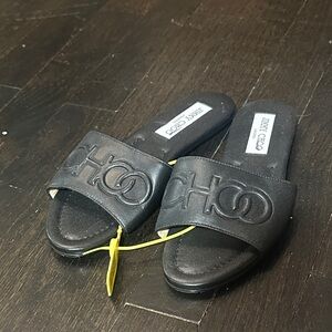 Jimmy Choo black leather flat sandals/slides, size 35.5